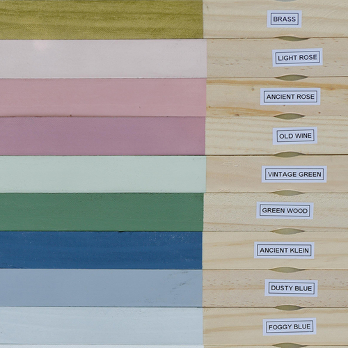 Colour samples painted on wood and photographed in daylight